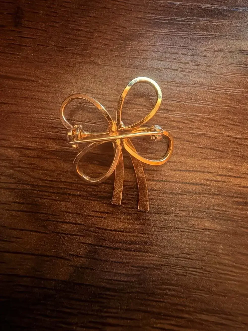 Vintage Gold-Tone Bow Brooch with Central Faux Pearl